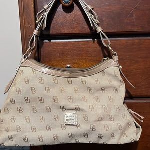 Dooney and Bourke shoulder bag tan canvas with “DB” pattern